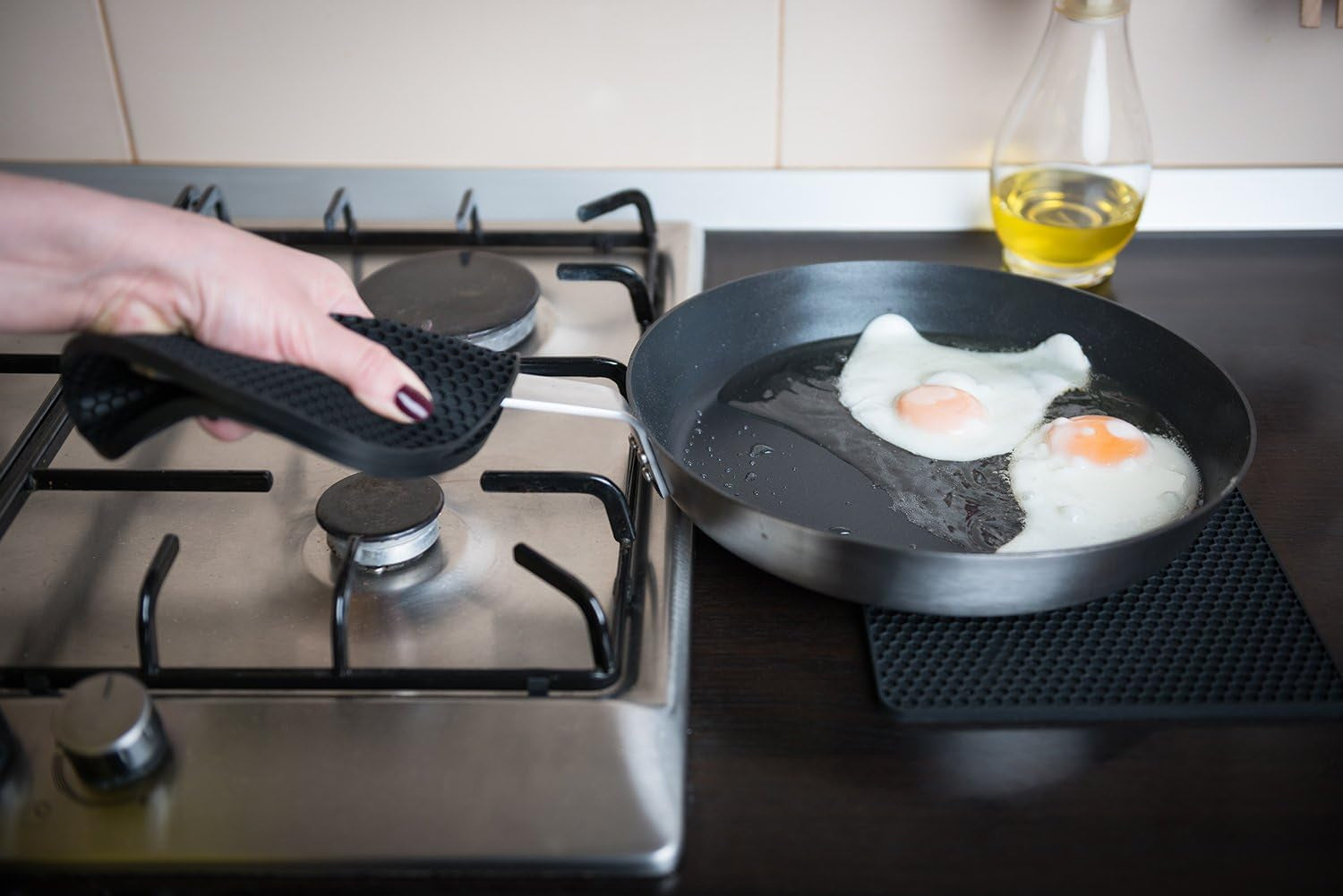 Silicone Pot Holders and Trivet Mats Heat Resistant to 440°F to Protect Your Table and Countertop Contains 4 Pieces Squared